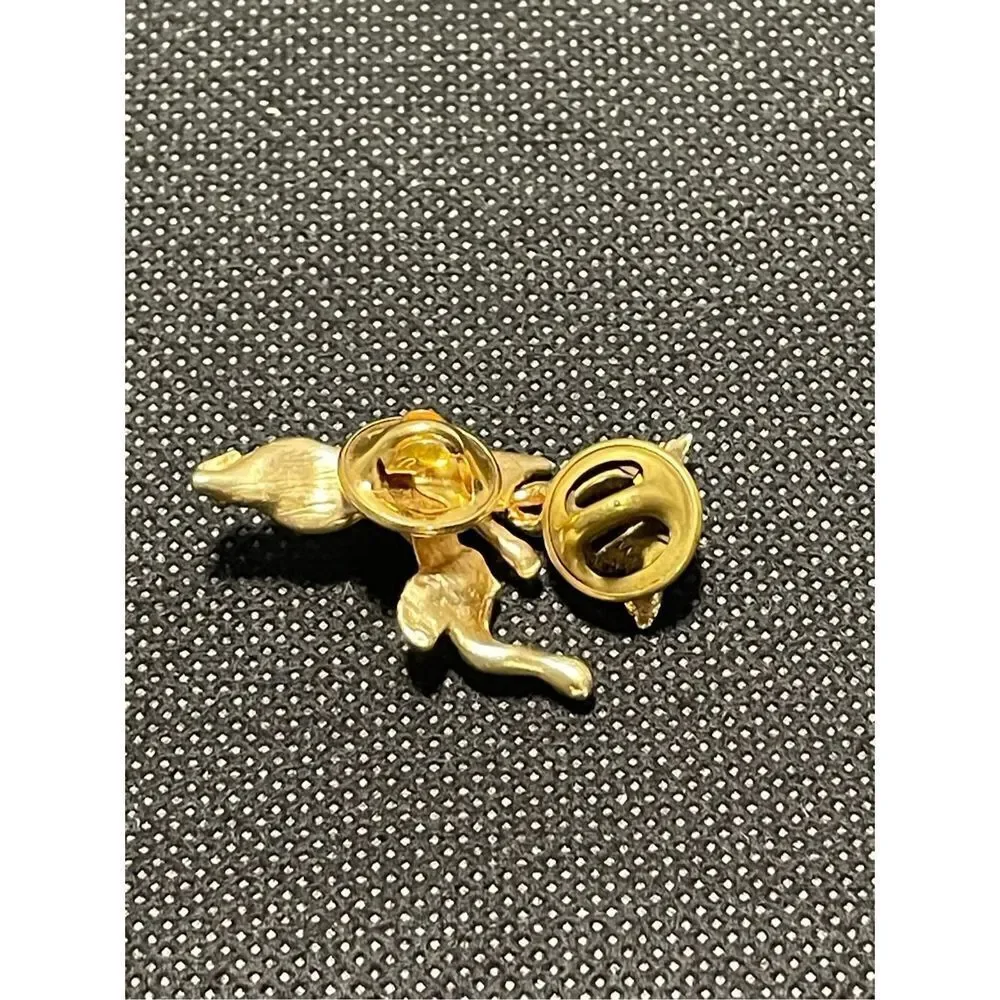 Two cherub pins￼